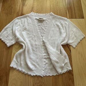 white mini cardigan with scallop trim